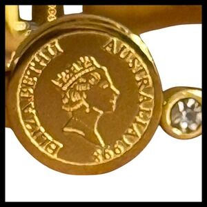 NWOT Gold Tone Queen Elizabeth II Coin Bracelet Adjustable Crystal Accent Bangle